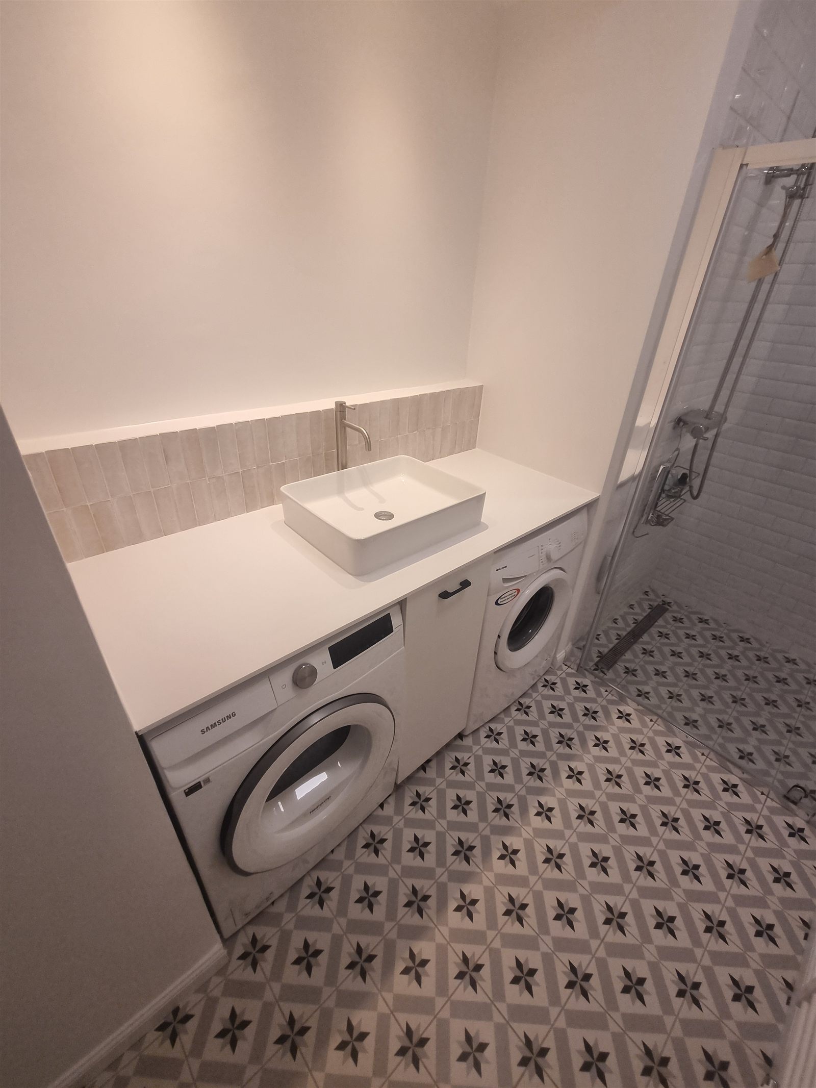 Renovated utility room with worktop and storage